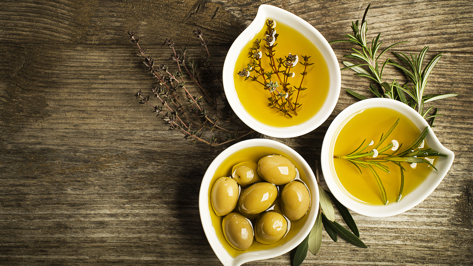 Greek herbs and olives in olive oil